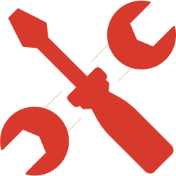 Vector graphic in red of a screwdriver crossed over a wrench.