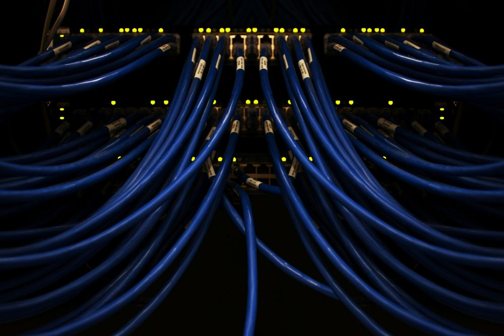 Wires connect servers within a data center.