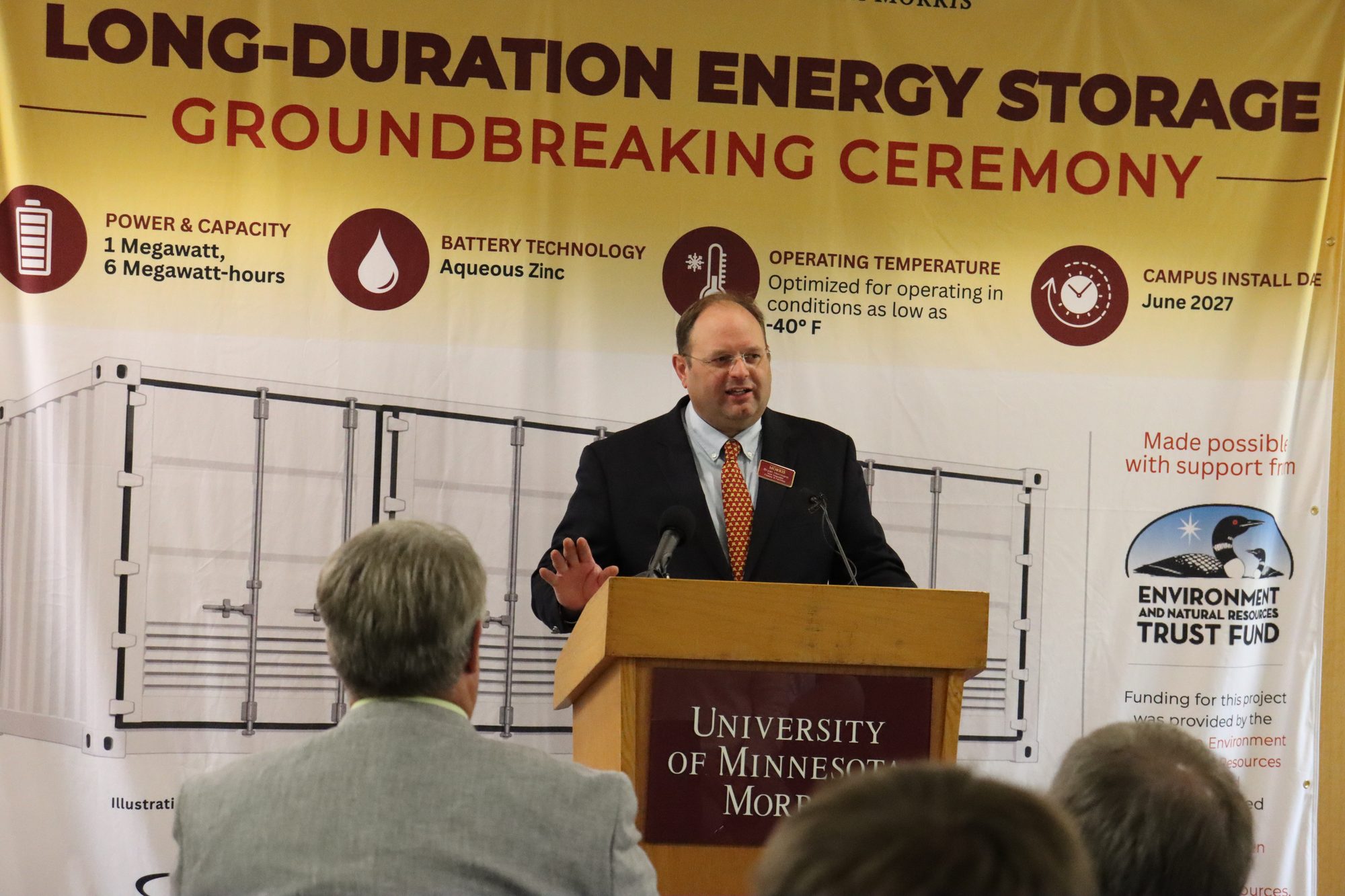 Bryan Herrmann, Vice Chancellor for Finance and Facilities at UMN Morris, speaks at the podium