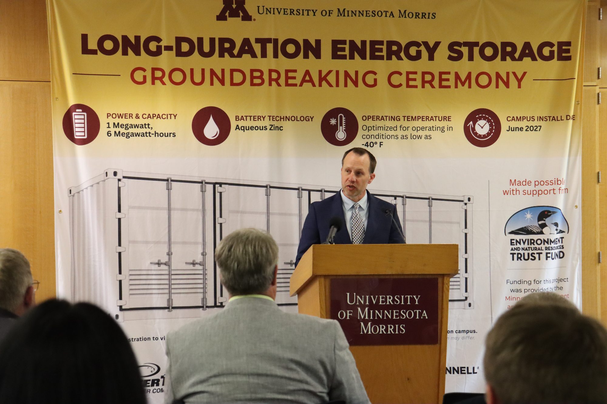 Jason Grenier of Otter Tail Power speaks at the University of Minnesota Morris podium