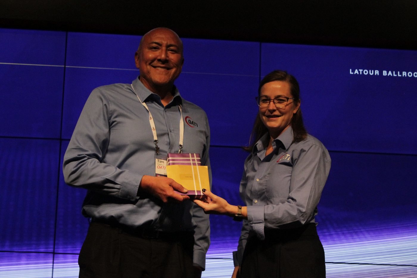 Tim Clashin of OATI accepts the Industry Impact Award on behalf of the Colville Tribes
