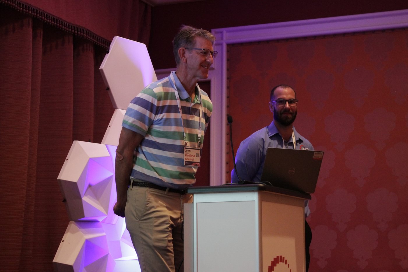 John Walker of Portland General Electric with his co-presenter at the podium